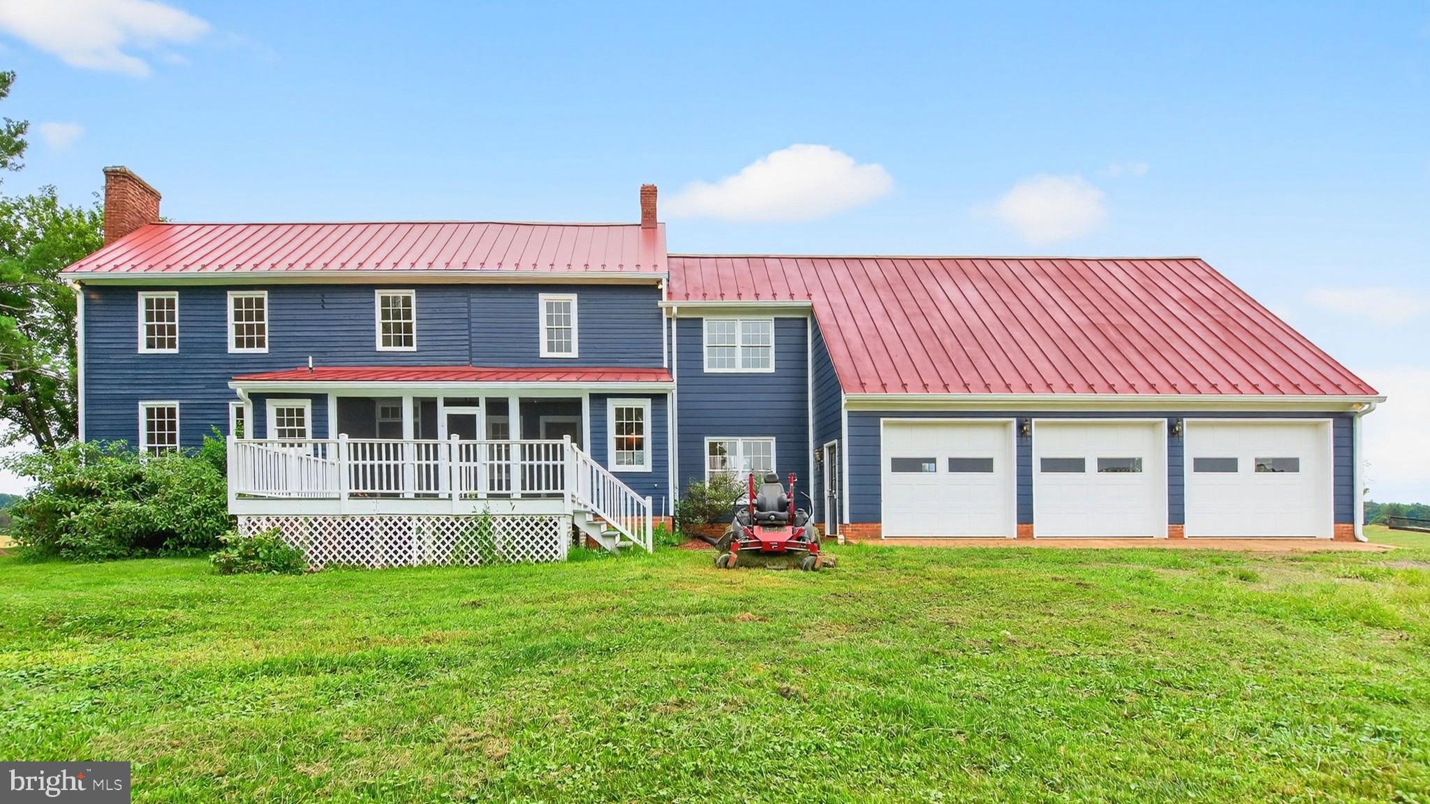9534 Spring Hill Lane Rixeyville, VA 22737 - Photo 30 of 70 a front view of a house with garden
