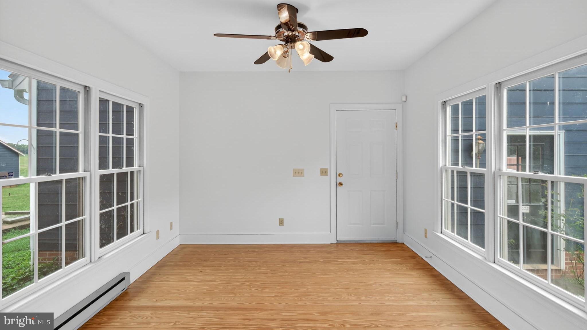 9534 Spring Hill Lane Rixeyville, VA 22737 - Photo 40 of 70 a view of an empty room with a window