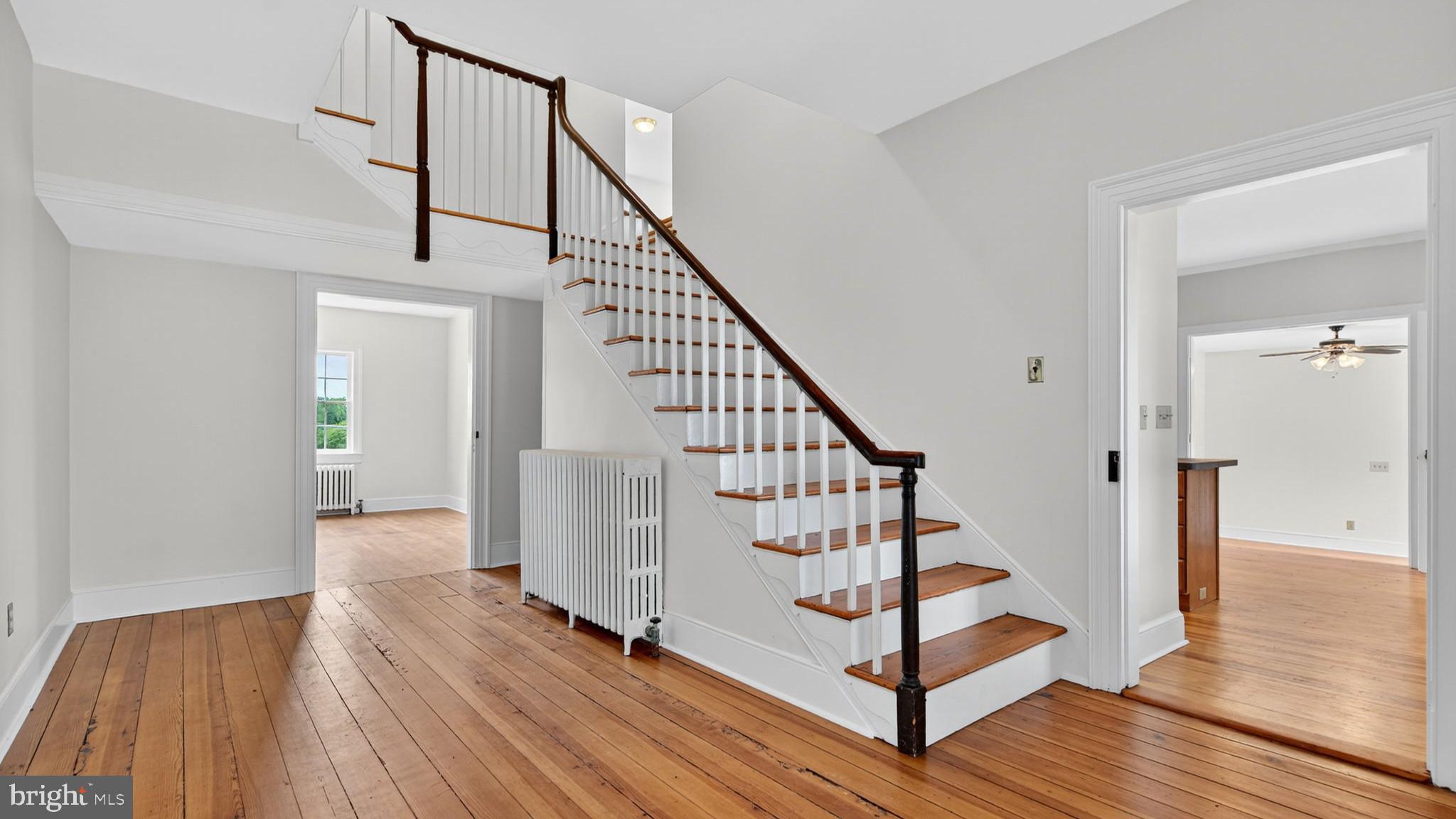 9534 Spring Hill Lane Rixeyville, VA 22737 - Photo 41 of 70 a view of entryway with wooden floor and stairs