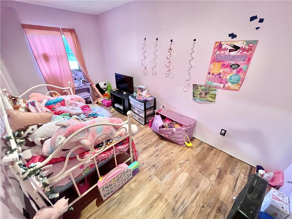 1381 Edmon Road Apollo, PA 15613 - Photo 15 of 29 a bedroom with a bed and a flat screen tv