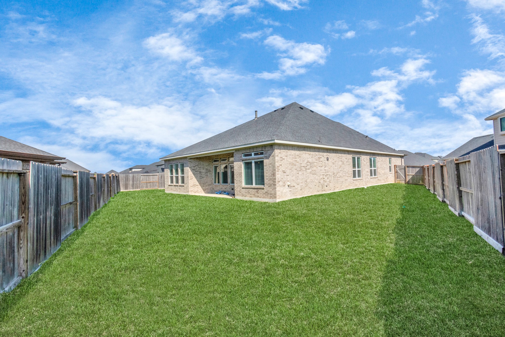 28646 Monarch Cliffs Drive Fulshear, TX 77441 - Photo 31 of 33 a view of a house with backyard and garden