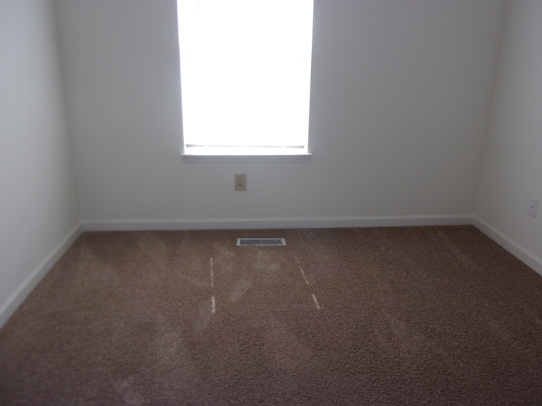 235 Hidden Acres, Unit A Lebanon, TN 37087 - Photo 12 of 14 an empty room with a window