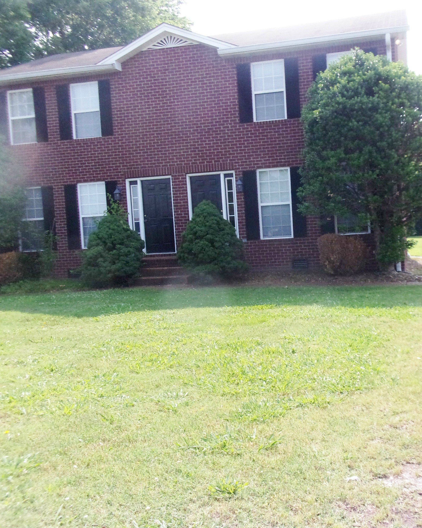 235 Hidden Acres, Unit A Lebanon, TN 37087 - Photo 3 of 14 a building view with a garden space