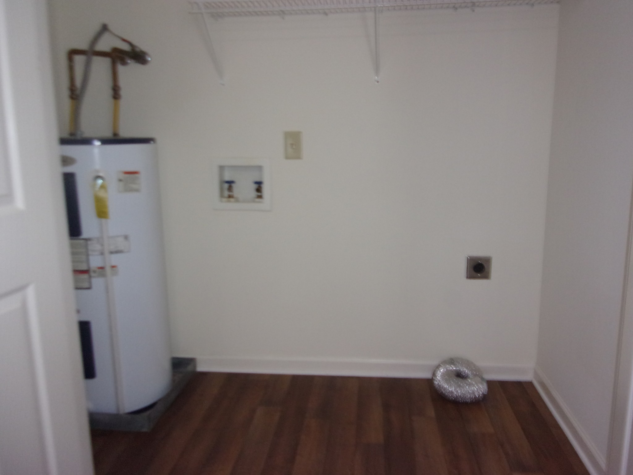 235 Hidden Acres, Unit A Lebanon, TN 37087 - Photo 6 of 14 a view of storage and utility room with wooden floor