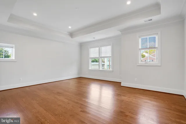 a bathroom with a bathtub a sink and a mirror