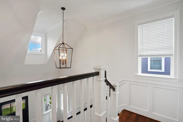 a view of a hallway with windows