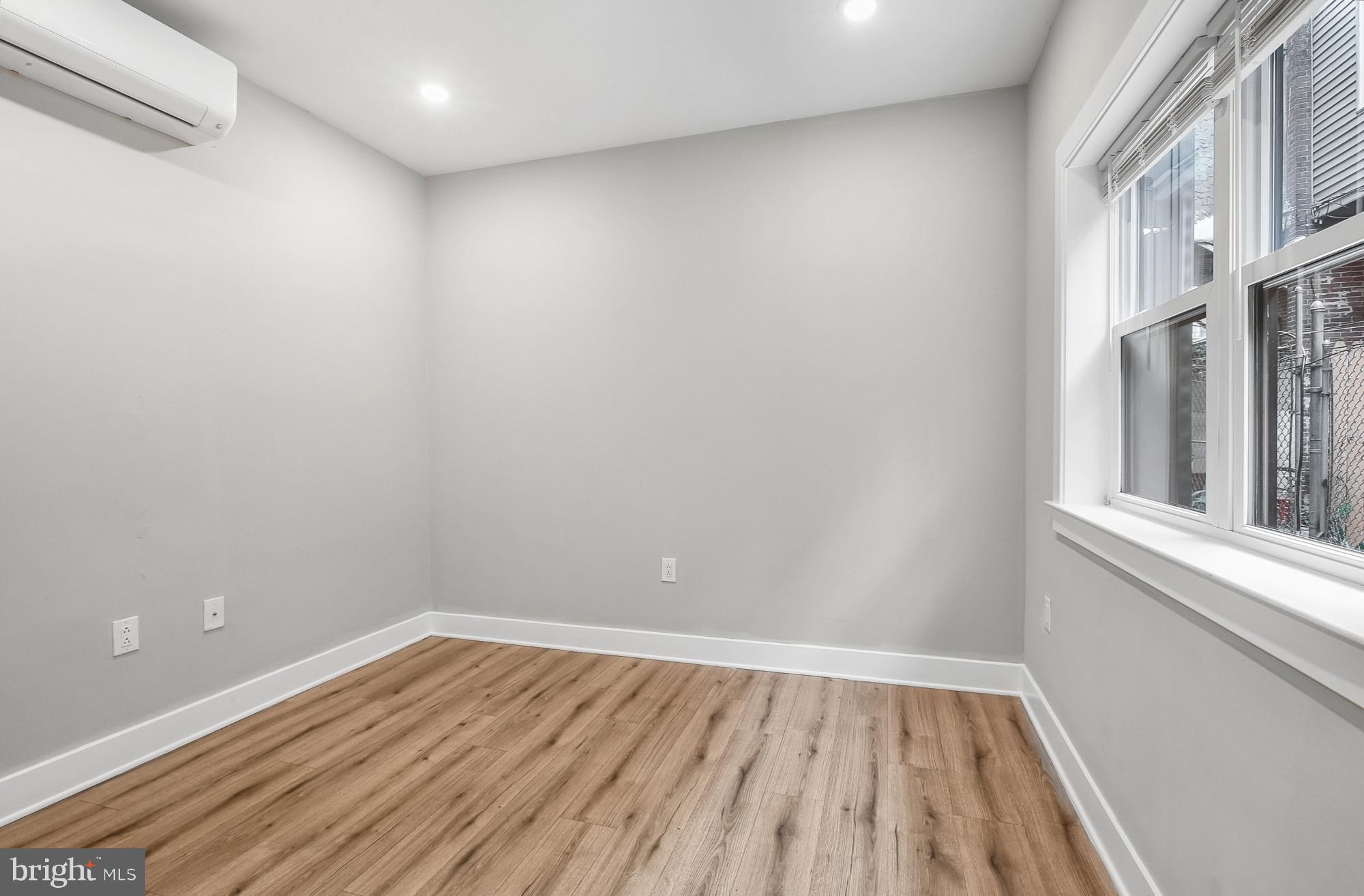 5007 Pentridge Street, Unit 1C Philadelphia, PA 19143 - Photo 11 of 14 a view of wooden floor in an empty room