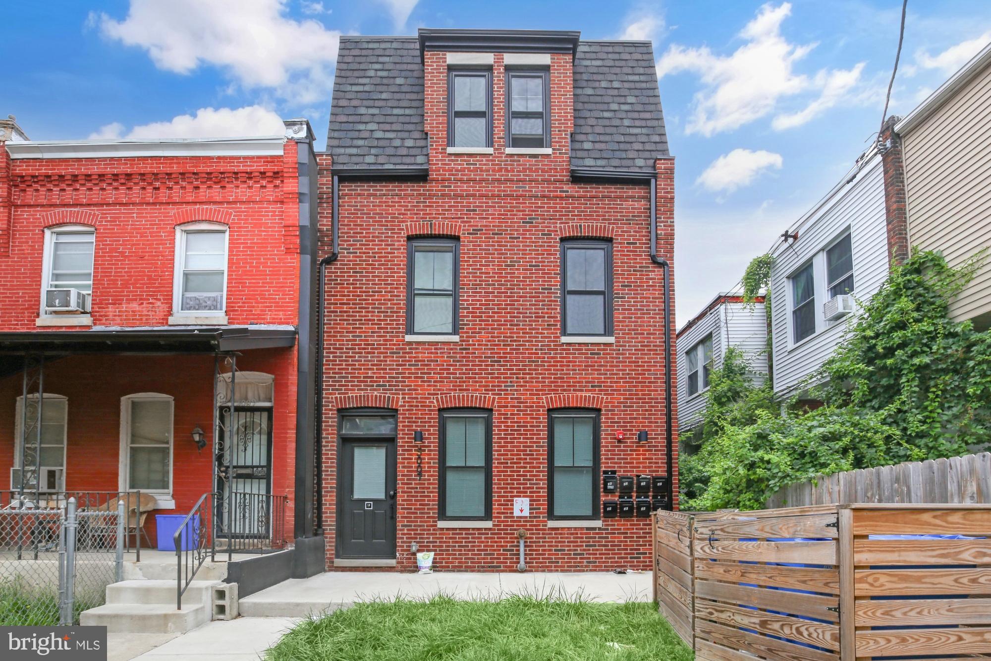 5007 Pentridge Street, Unit 1C Philadelphia, PA 19143 - Photo 13 of 14 a front view of a building