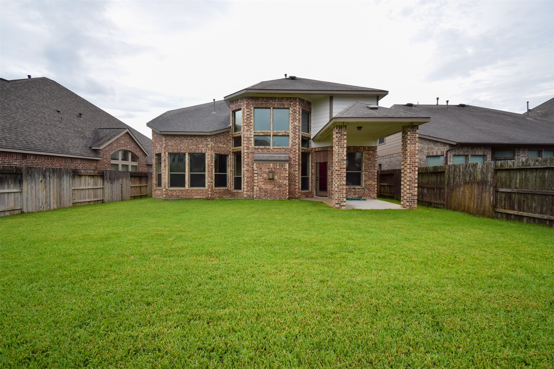 27363 Pendleton Trace Drive Spring, TX 77386 - Photo 25 of 26 front view of a brick house with a yard