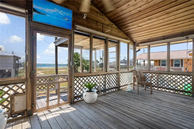 a view of living room and wooden floor