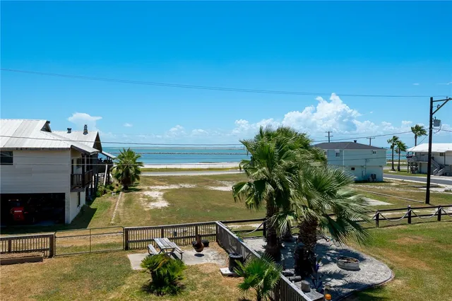 a view of a balcony with ocean view