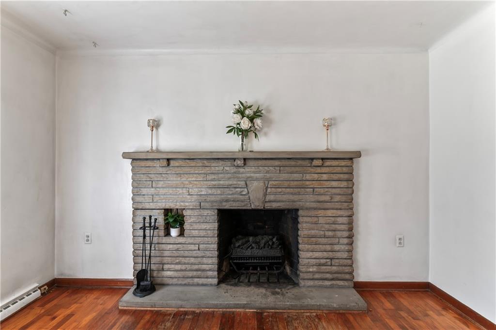 530 Helen Street Rochester, PA 15074 - Photo 4 of 22 a living room with furniture and a fireplace