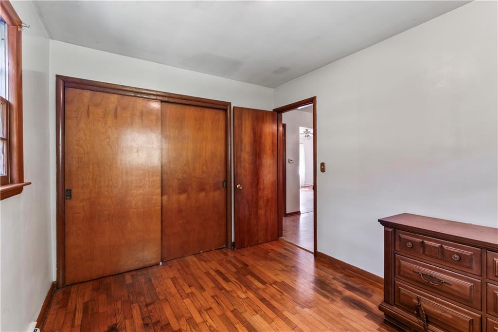 530 Helen Street Rochester, PA 15074 - Photo 10 of 22 a view of an empty room with wooden floor and a window
