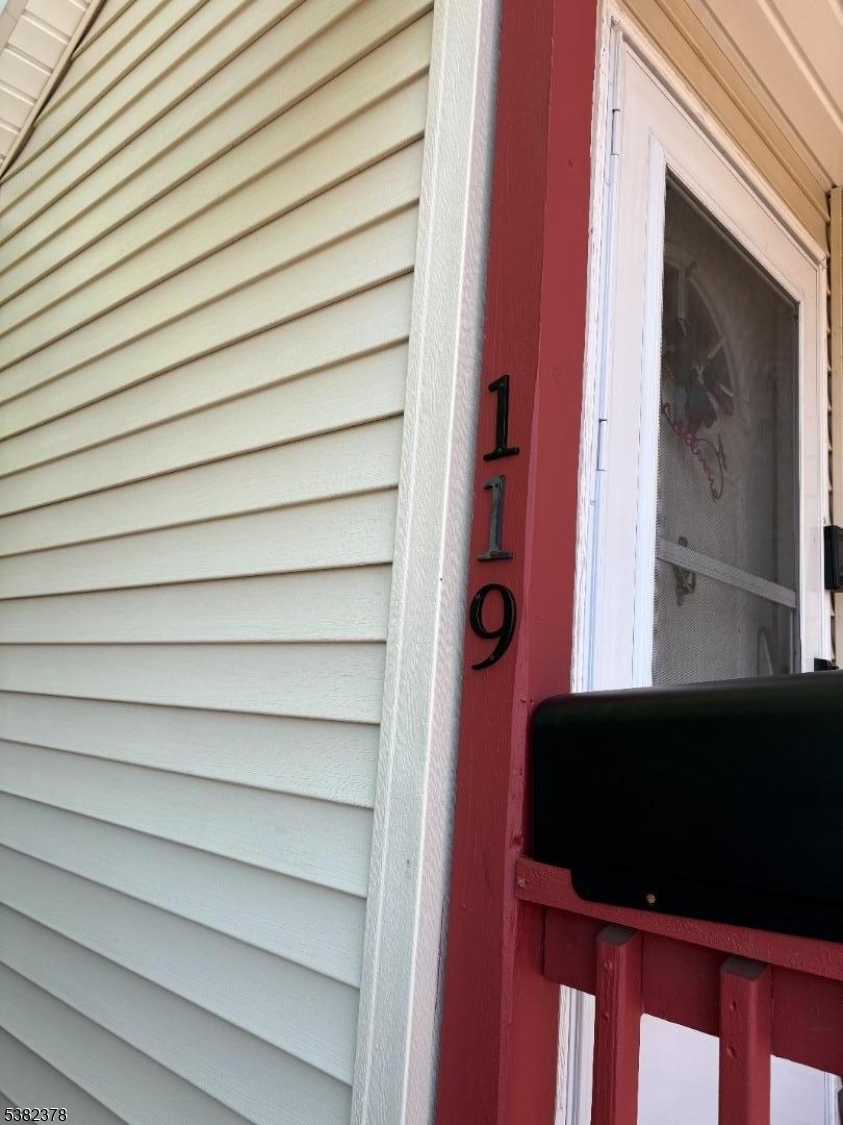 49 Hope Street Passaic, NJ 07055 - Photo 2 of 9 a view of a wooden door