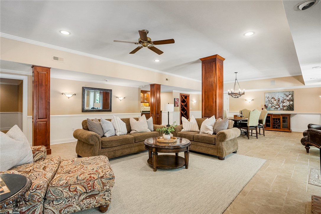 200 Graylyn Drive Anderson, SC 29621 - Photo 32 of 48 A spacious lower level retreat offers ample room for relaxation and entertaining, highlighted by a dining area and wine storage.