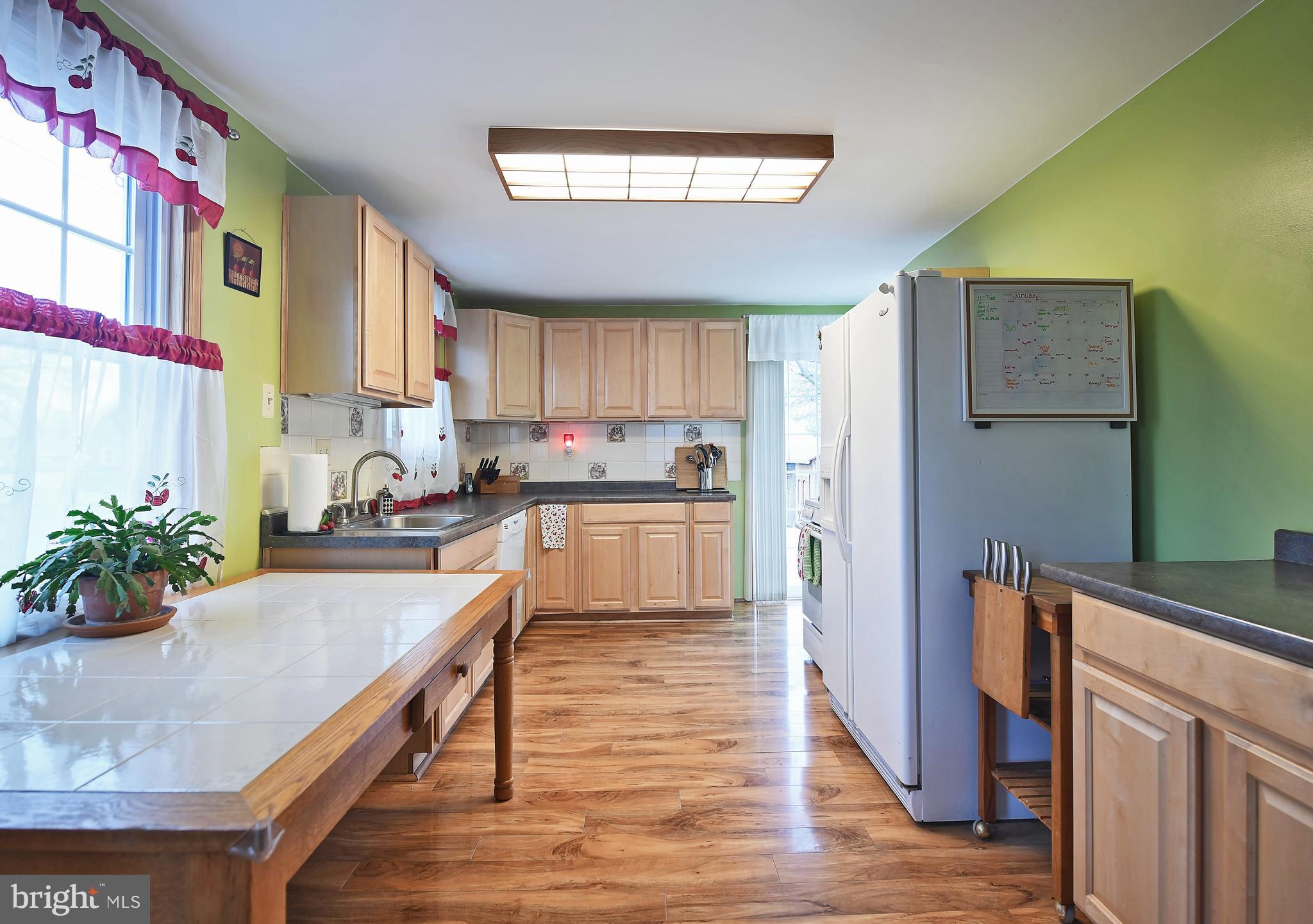 2011 Oakland Road Baltimore, MD 21220 - Photo 12 of 33 Maple wood cabinets & clean white appliances!