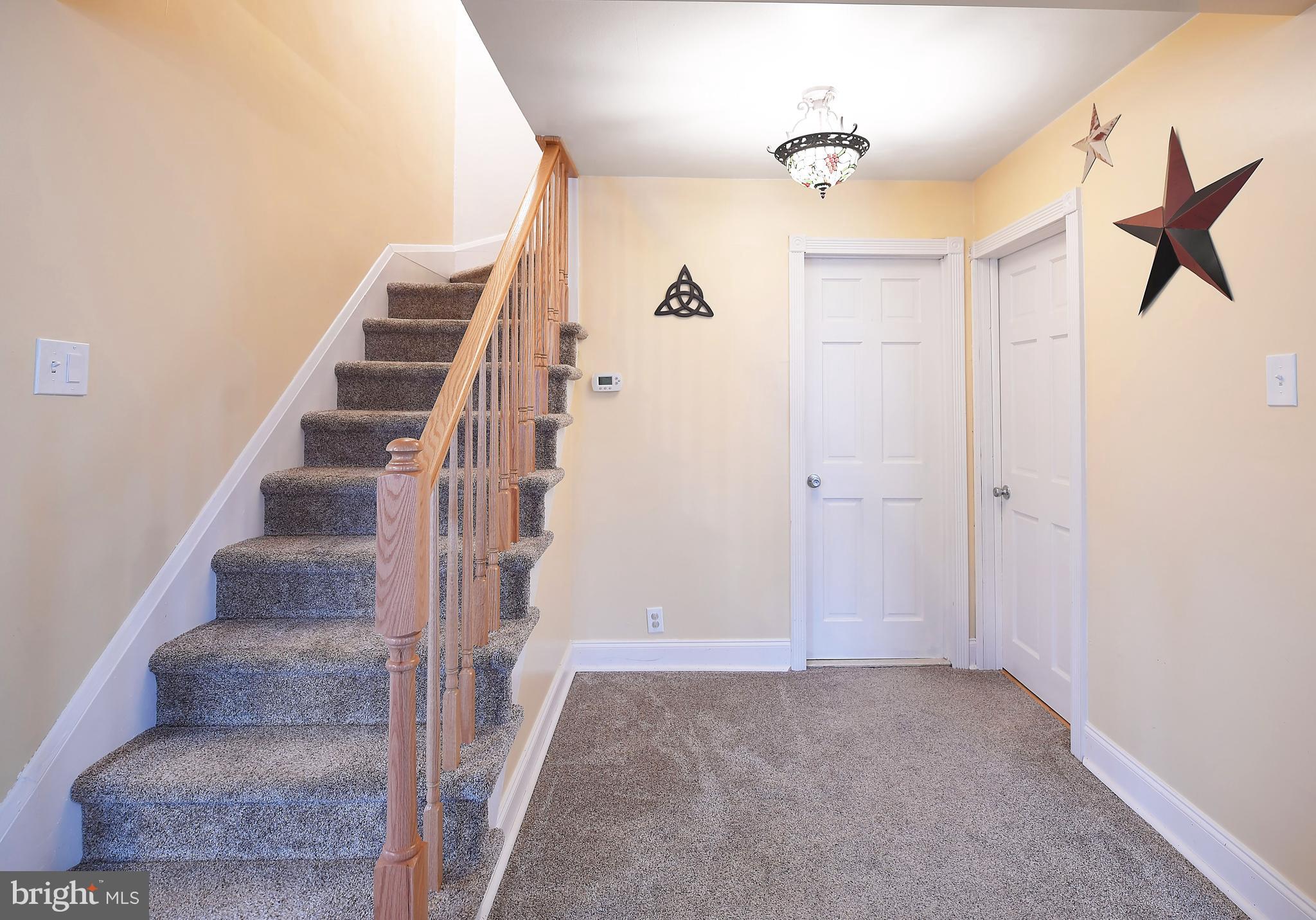 2011 Oakland Road Baltimore, MD 21220 - Photo 17 of 33 Stairs to upper level remodeled bedrooms!