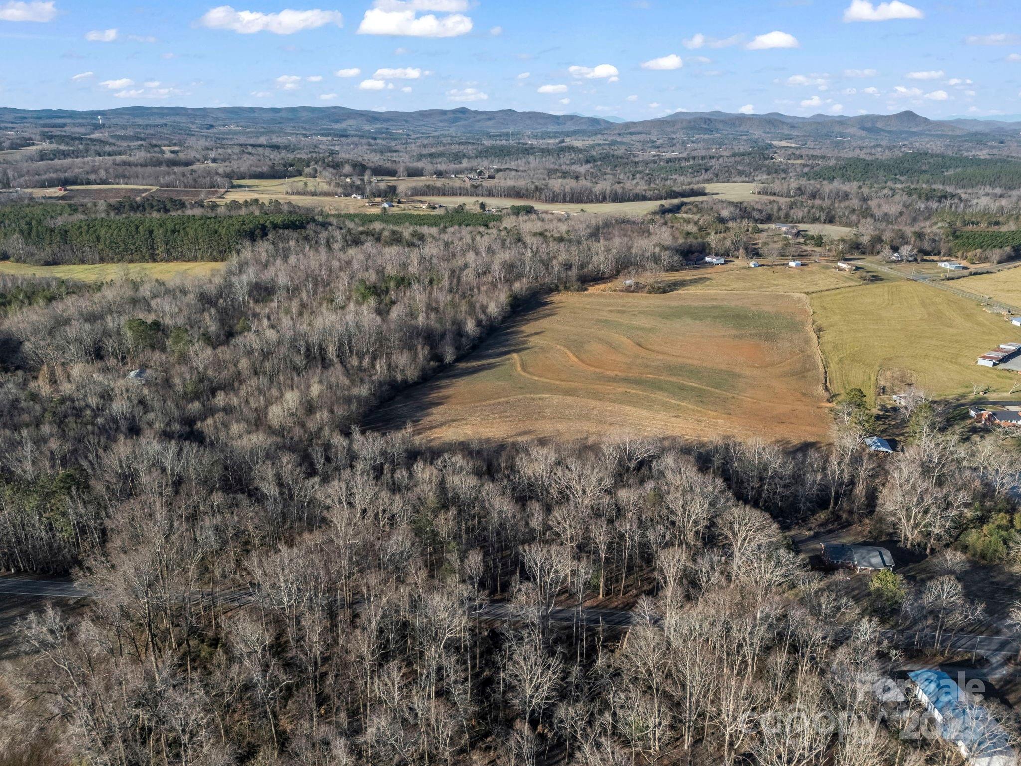 5357 Casar Road Casar, NC 28020 - Photo 7 of 10 a view of a lake with a mountain