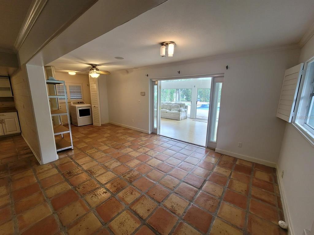 11129 Lake Butler Boulevard Windermere, FL 34786 - Photo 4 of 17 a view of a livingroom with a fireplace