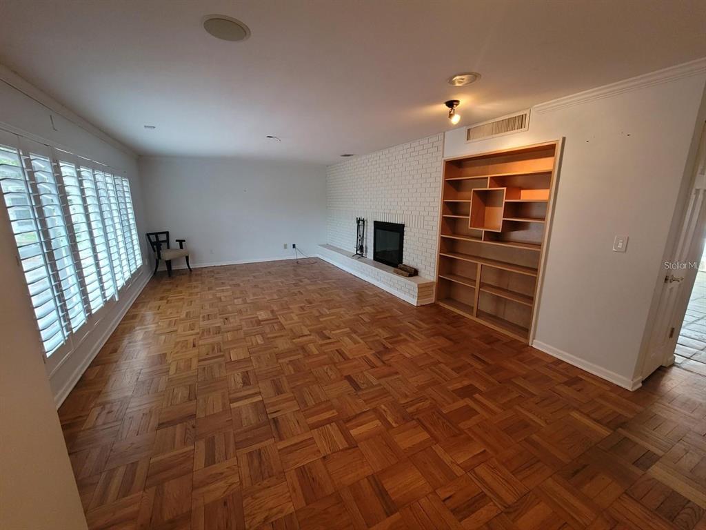 11129 Lake Butler Boulevard Windermere, FL 34786 - Photo 5 of 17 en empty room with windows