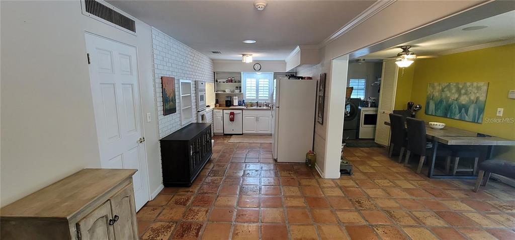 11129 Lake Butler Boulevard Windermere, FL 34786 - Photo 8 of 17 a kitchen with stainless steel appliances a refrigerator and a stove