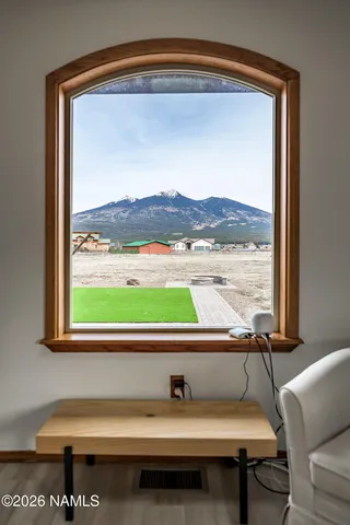 a view of yard with car parked