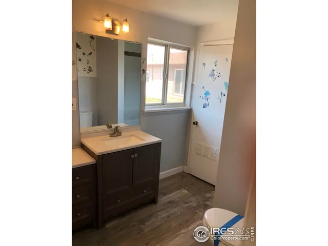 a view of a house with a yard and garage