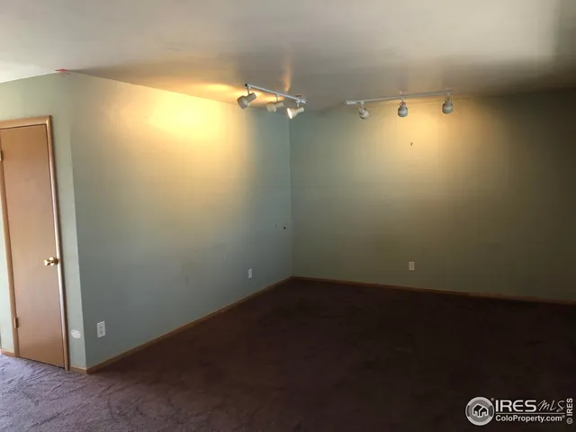 an empty room with a door