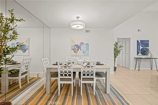 a kitchen with a sink cabinets and stainless steel appliances