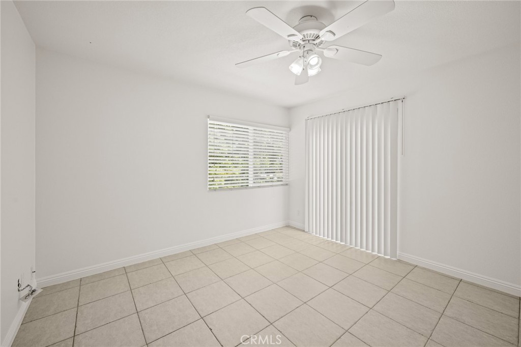 34004 Selva Road, Unit 377 Dana Point, CA 92629 - Photo 19 of 38 an empty room with windows and fan