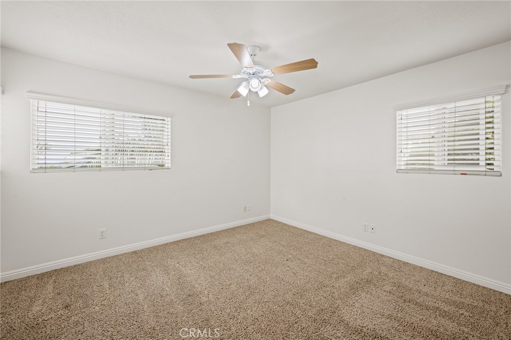 34004 Selva Road, Unit 377 Dana Point, CA 92629 - Photo 21 of 38 a view of an empty room with a window