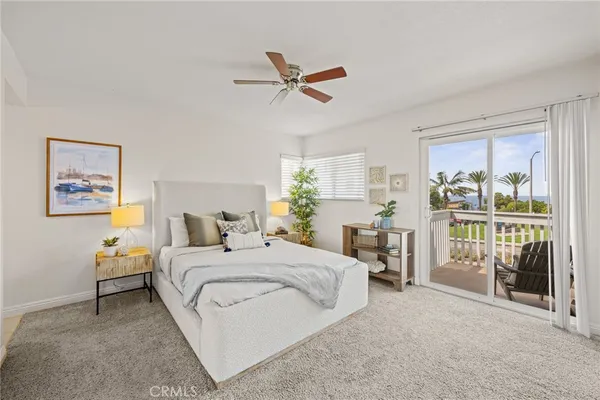 a view of a livingroom with furniture and windows