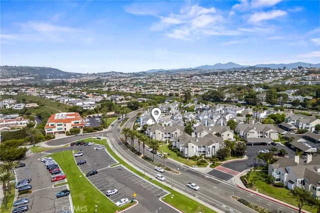 an aerial view of residential building with an outdoor space