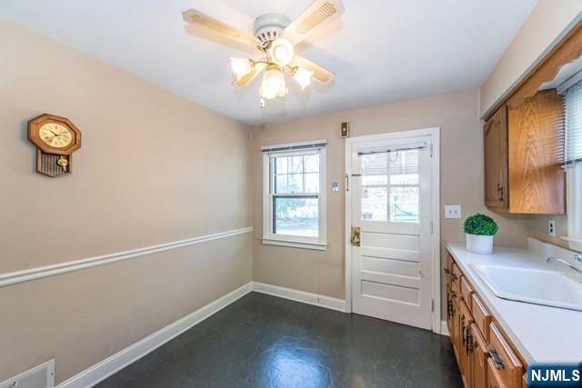 153 Madison Avenue Rochelle Park, NJ 07662 - Photo 6 of 26 a view of workspace with window and wooden floor