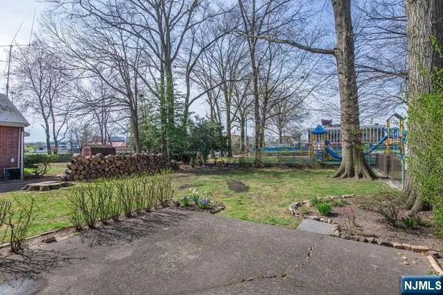 a view of backyard with green space