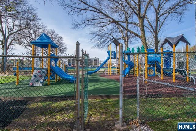 153 Madison Avenue Rochelle Park, NJ 07662 - Photo 10 of 26 a view of a park with iron fence