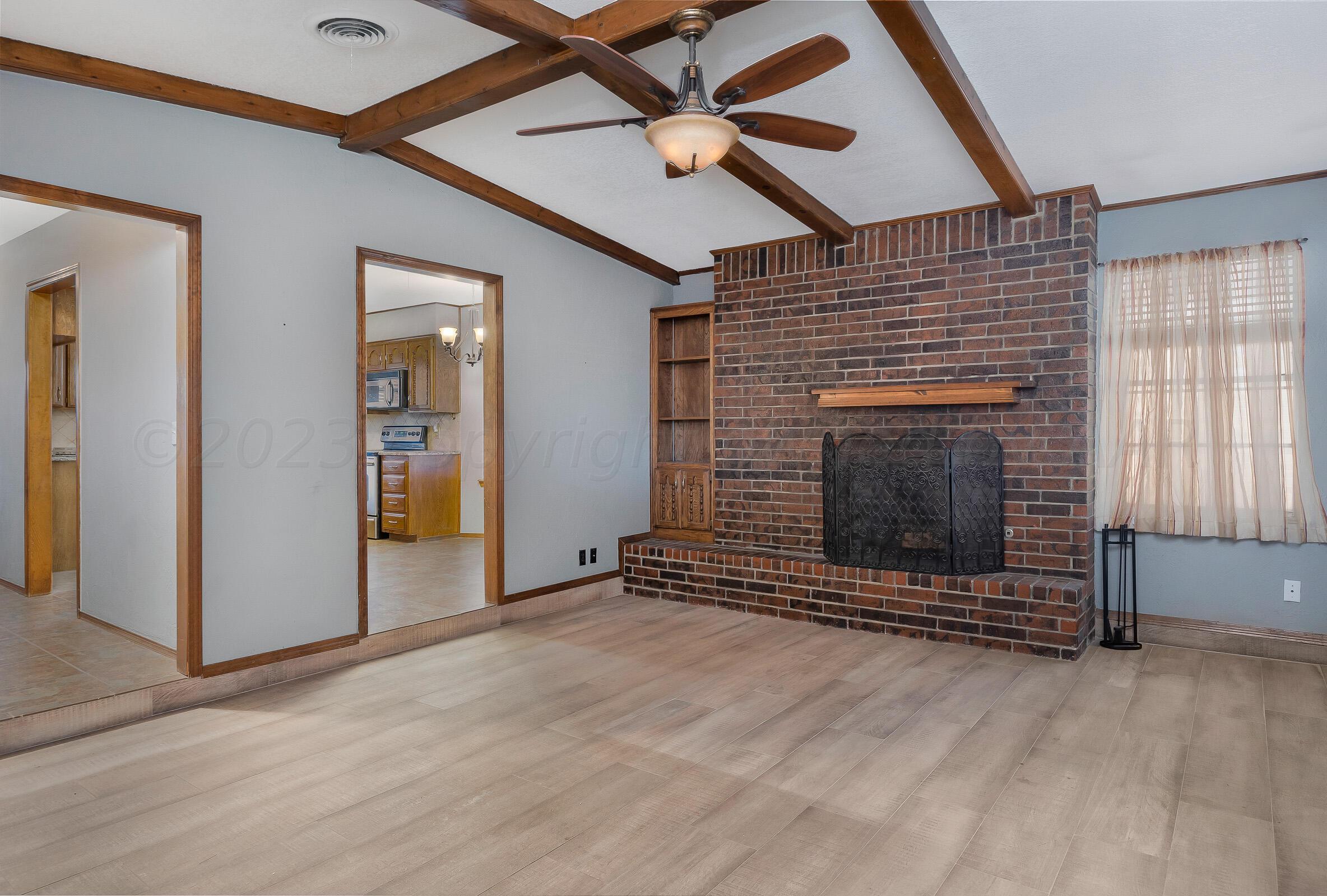 5705 South Fannin Street Amarillo, TX 79110 - Photo 3 of 21 004_Living Room 2