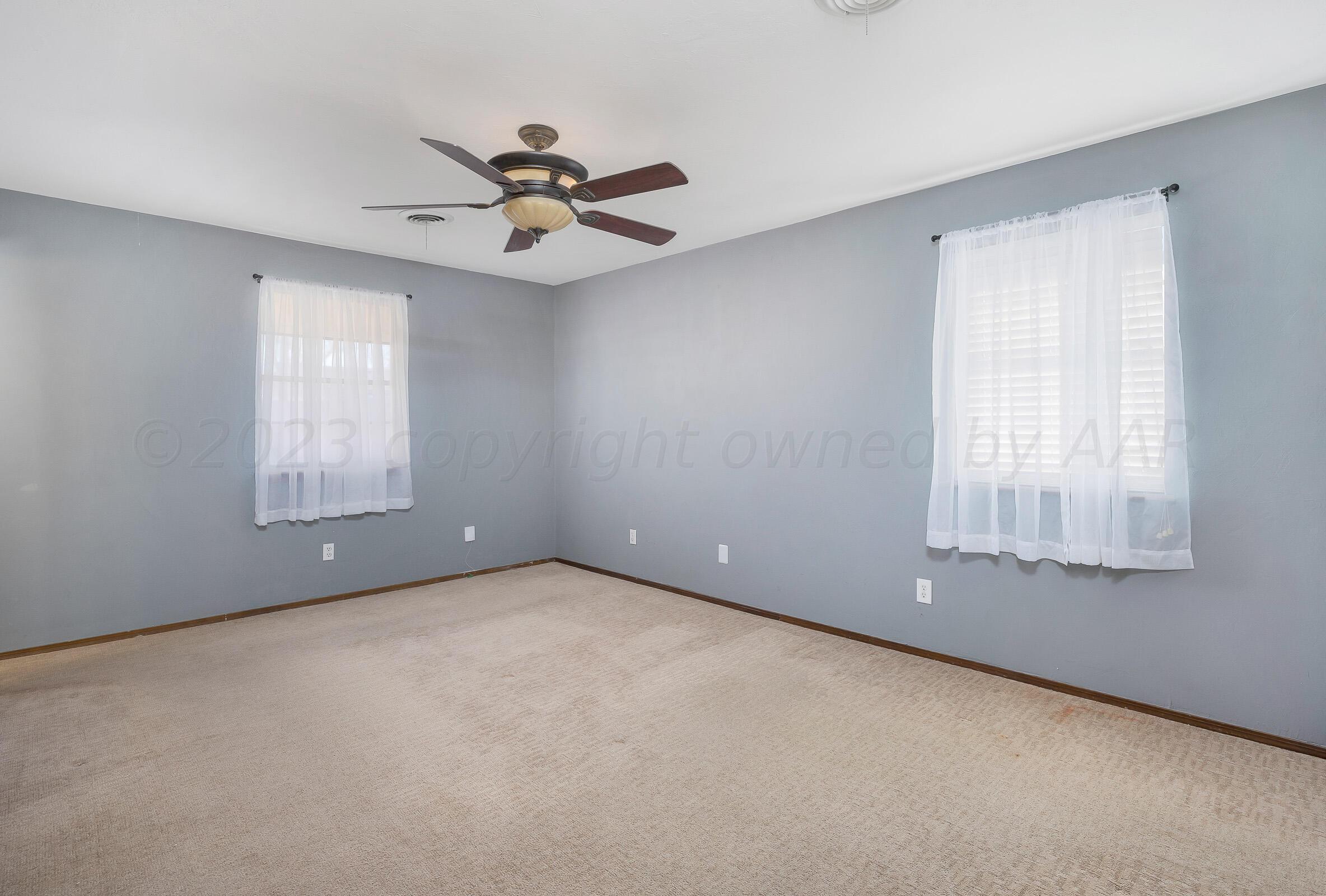 5705 South Fannin Street Amarillo, TX 79110 - Photo 8 of 21 009_Master Bedroom