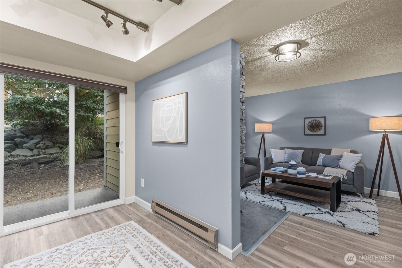 2001 East Yesler Way, Unit 46 Seattle, WA 98122 - Photo 8 of 20 a living room with furniture and a window