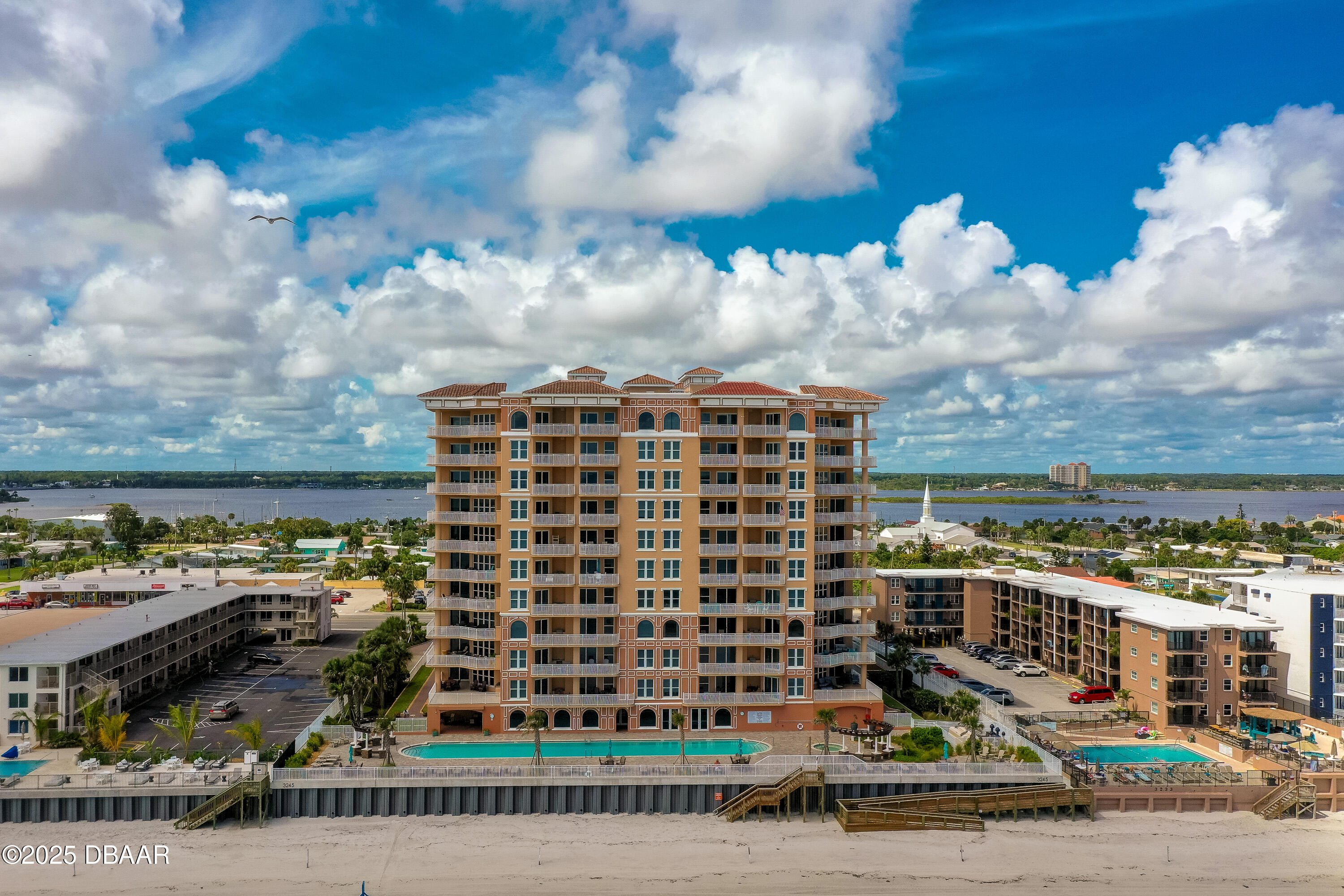 3245 South Atlantic Avenue, Unit 601 Daytona Beach, FL 32118 - Photo 3 of 48 a view of a city with tall buildings