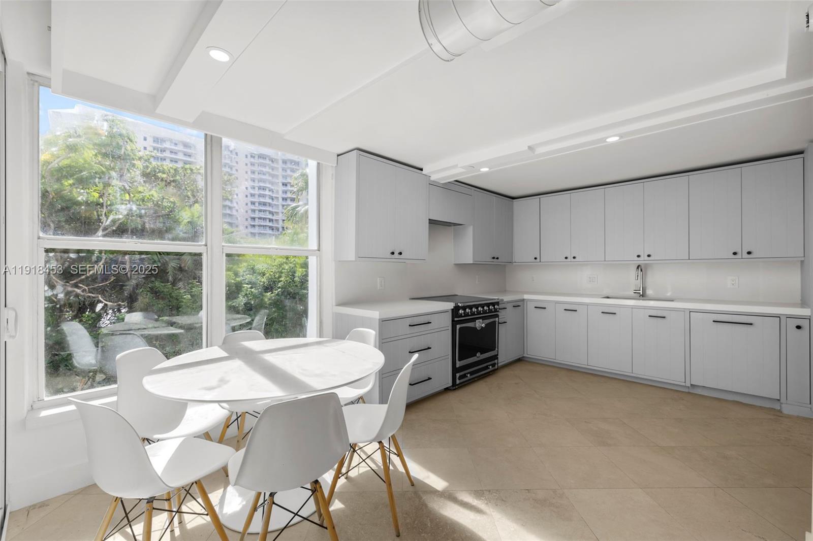 605 Ocean Drive, Unit 2L Key Biscayne, FL 33149 - Photo 12 of 46 SPACIOUS EAT IN REMODELEDKITCHEN