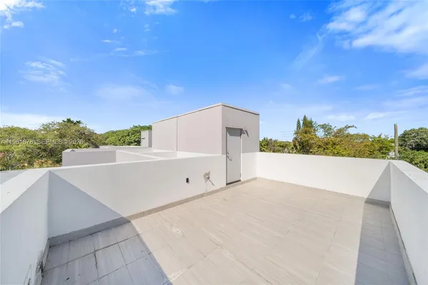 a view of a street with a houses
