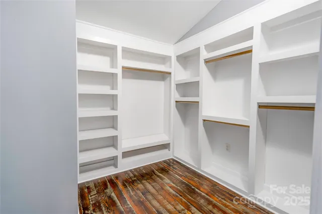 a view of an empty walk in closet