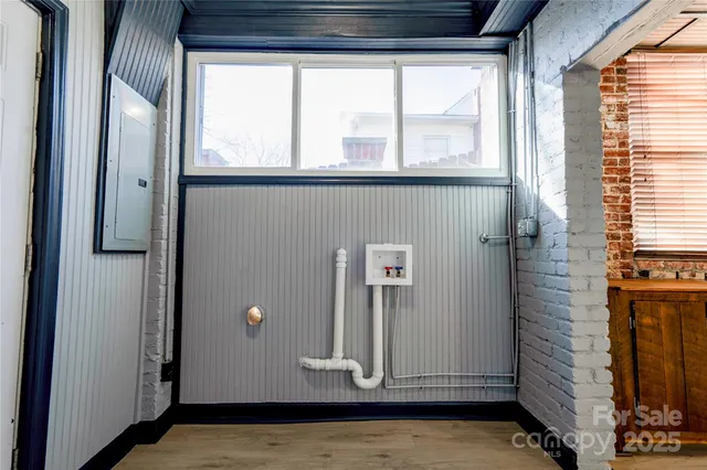 a bathroom with a bathtub and toilet