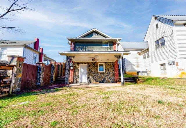 a view of a town with large trees