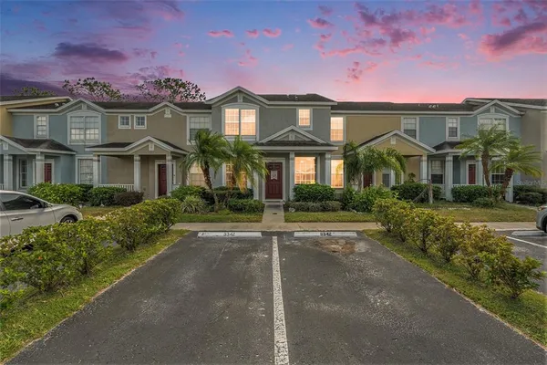 front view of a house with a yard
