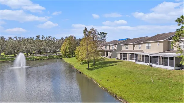 a view of a lake with a houses