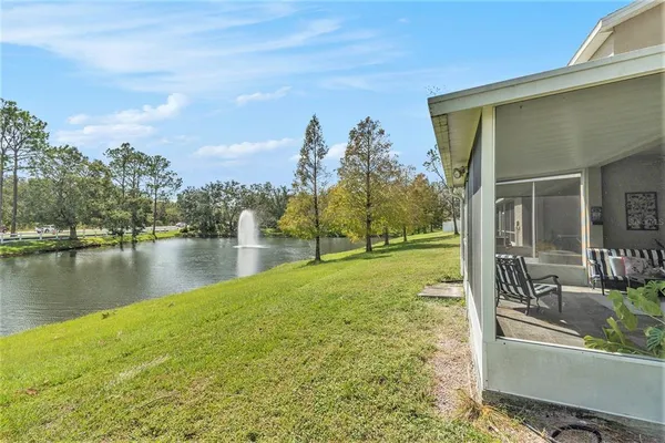 a view of a yard with an outdoor seating