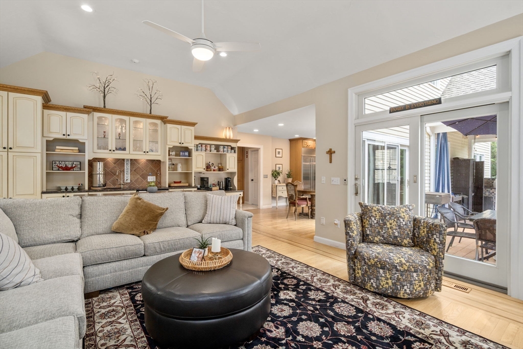 63 High Street Shrewsbury, MA 01545 - Photo 18 of 40 a living room with furniture and a rug