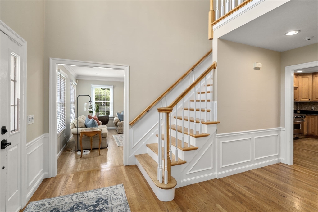 63 High Street Shrewsbury, MA 01545 - Photo 24 of 40 a view of entryway and hall with wooden floor